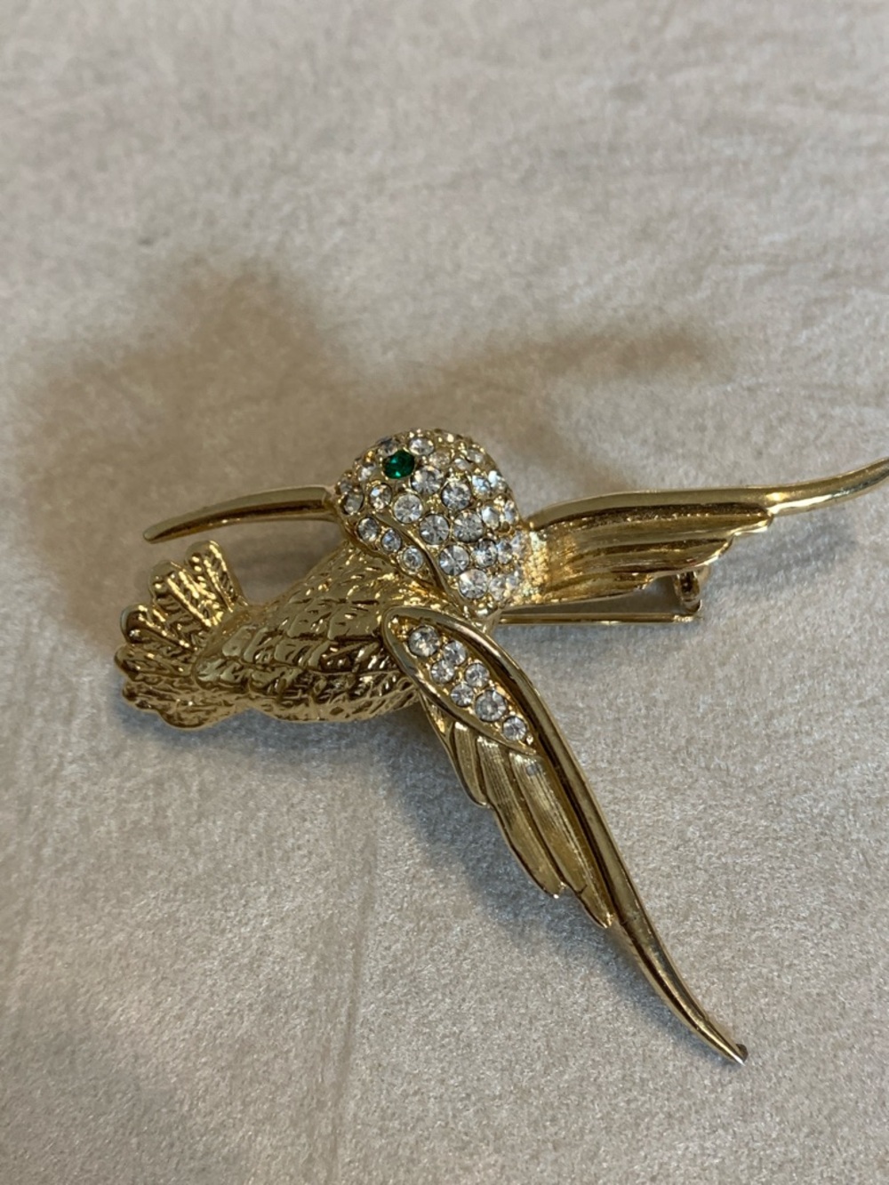 Gold-tone Crystal Hummingbird Brooch with Emerald Eye